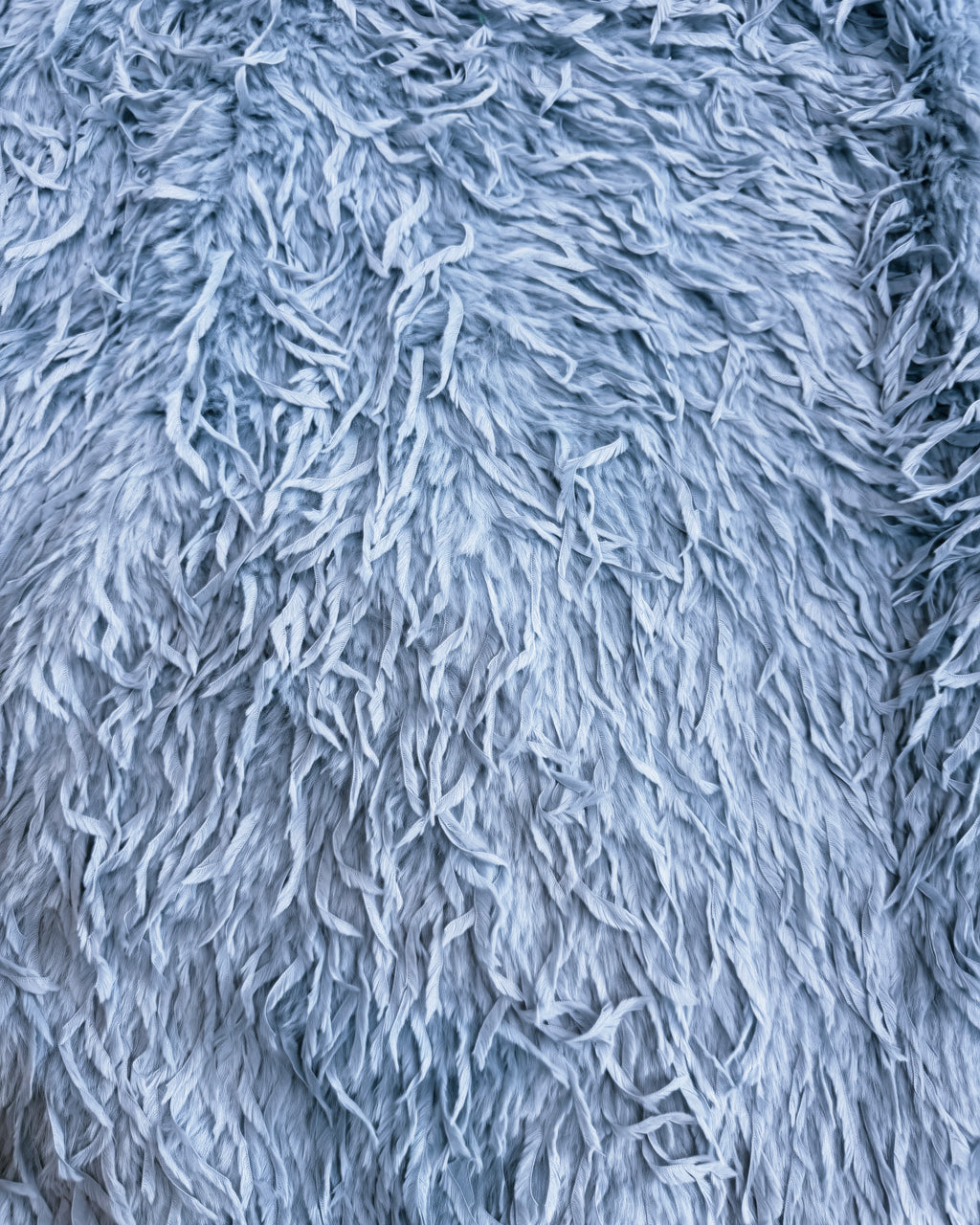 blue feather faux sweater