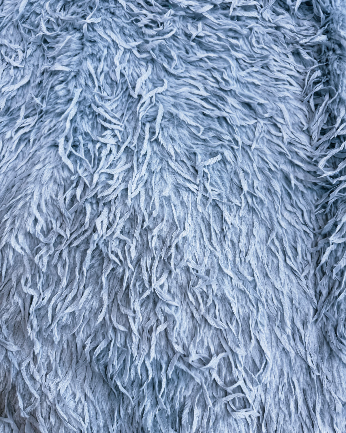 blue feather faux sweater
